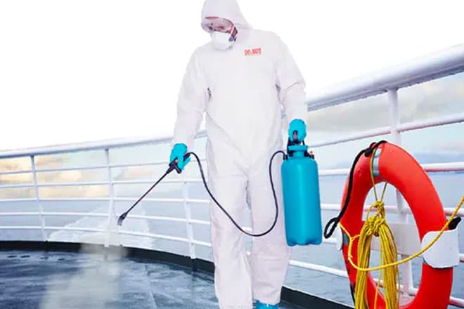 Cargo vessel berthed at port awaiting fumigation and sanitation certification